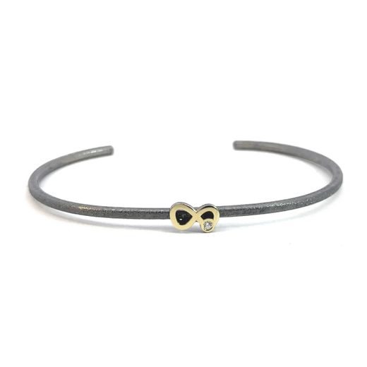 Anillo MIQUEL SARDÀ de plata, oro y diamante. 25027