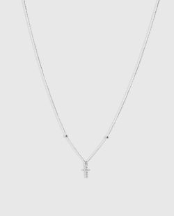 Collar cruz de oro y diamantes.