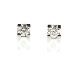 Pendientes dormilonas SATERRA oro blanco con brillante de 0.10 quilates