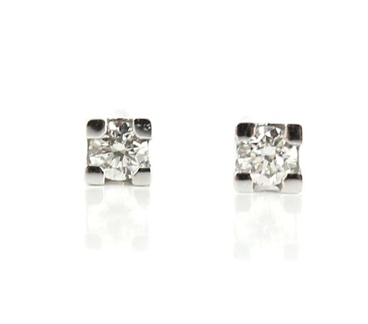 Pendientes dormilonas SATERRA oro blanco con brillante de 0.10 quilates