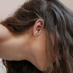 Pendientes JOIDART dorados pequeños LIGNIS estrechos. J3421AR043200