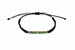Pulsera SATERRA oro amarillo, brillante y esmeraldas verdes.