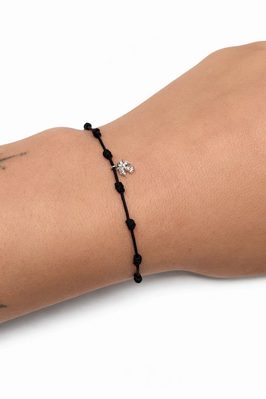 Pulsera SATERRA oro palmera y nylon.