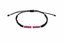 Pulsera SATERRA oro rosa, brillante y rubís rojos.